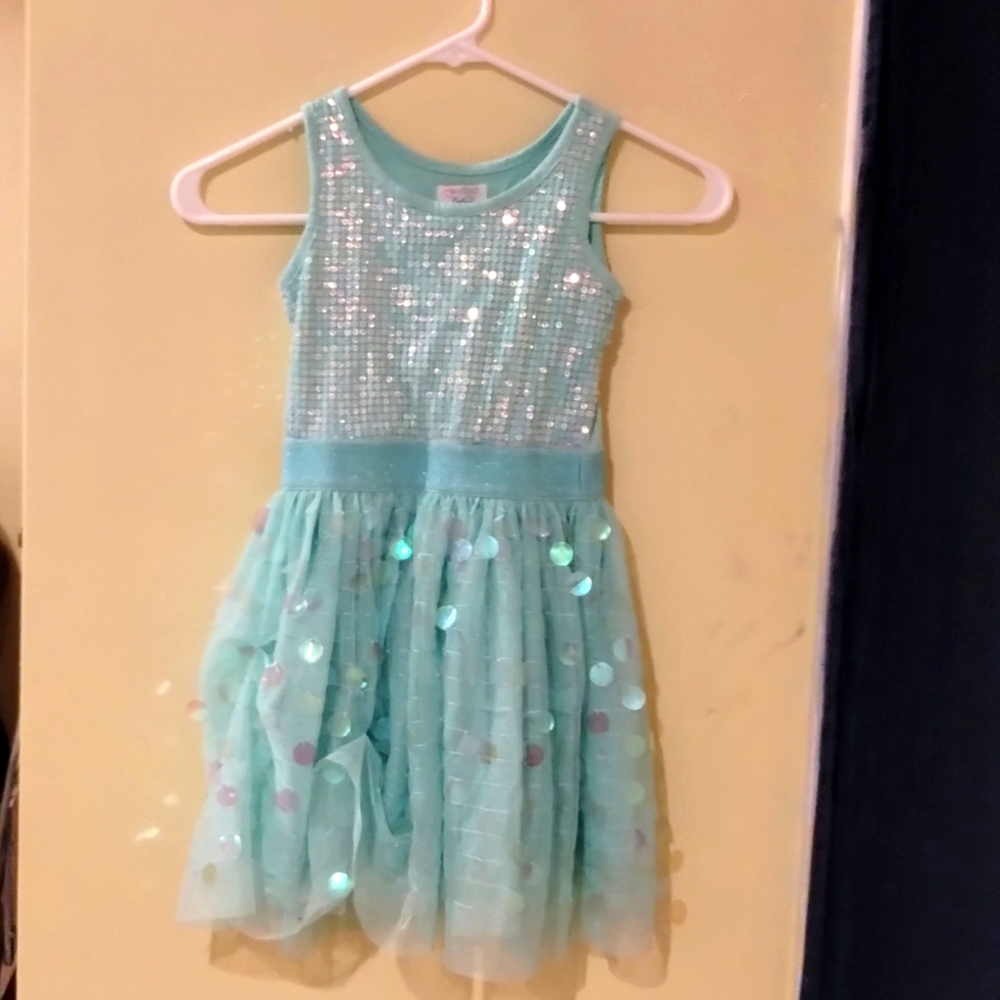 A children's blue sparkling dress